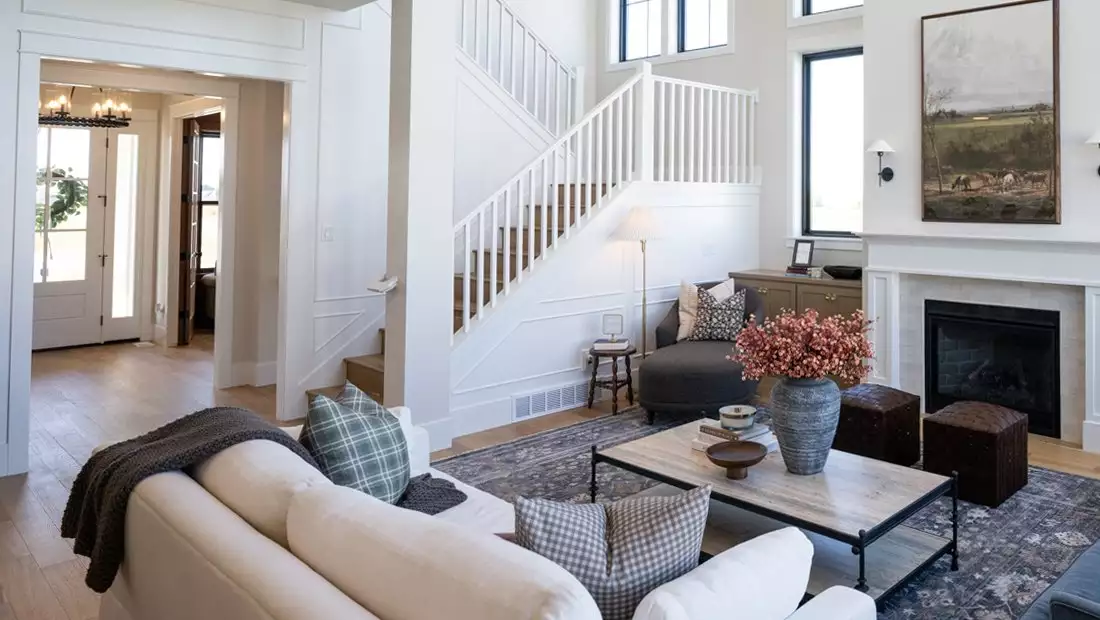 Bright Living Area featuring Staircase and Entryway