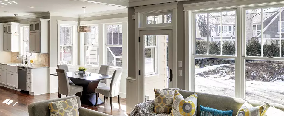 Bright House Interior featuring Windows and Glass Door