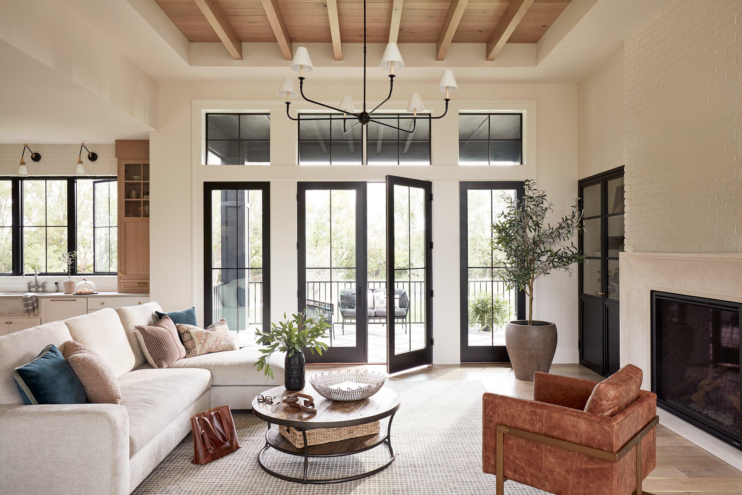 Pella® Lifestyle Series Clad Wood Hinged Patio Door and Pella® Impervia® Fiberglass Windows